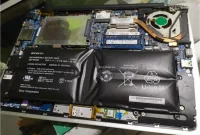 penyebab baterai laptop kembung